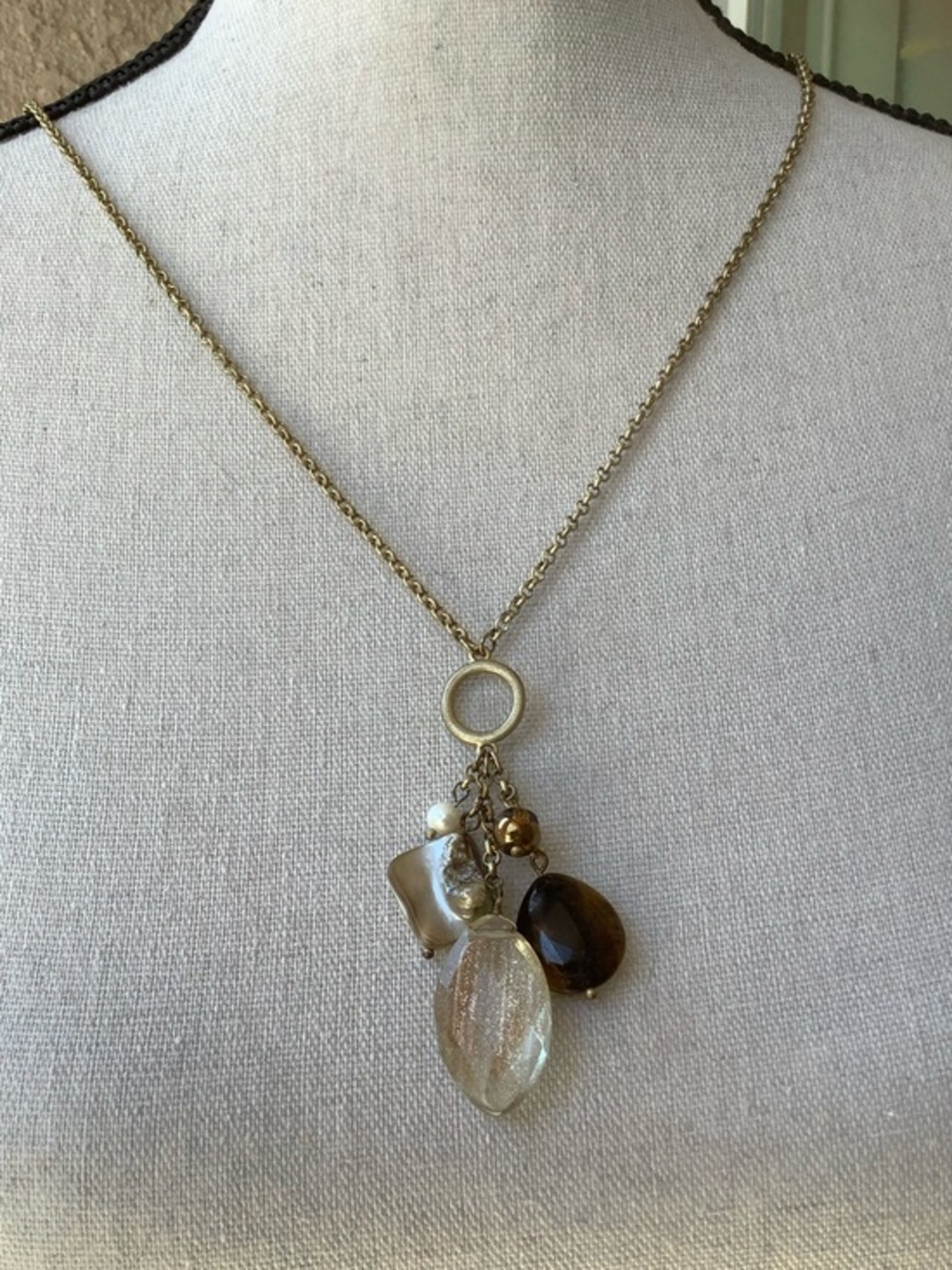 Gold Tone Multi-Charm Pendant Necklace